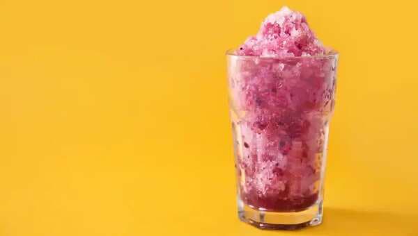 Beat the summer heat with this low-cal pomegranate and strawberry slush