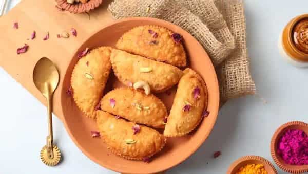 Give your Holi feast a healthy twist with this scrumptious baked gujiya recipe