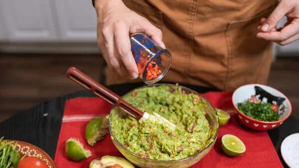 Guacamole: A Creamy Mexican Dip To Pair With A Bowl Of Nachos