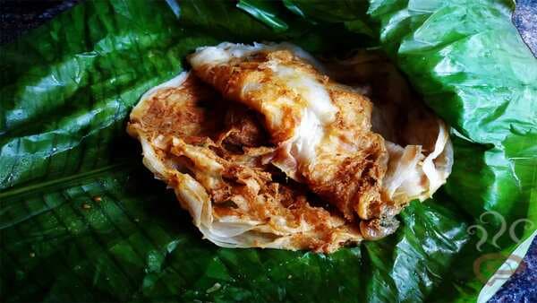 Kizhi Parotta: This Egg-Chicken Parotta Is Cooked Inside A Banana Leaf