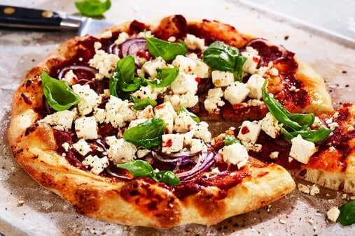 Pizza With Tomato Black Olives And Fetta