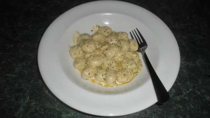 Ricotta Gnocchi With Butter Garlic And Herb Cream Sauce
