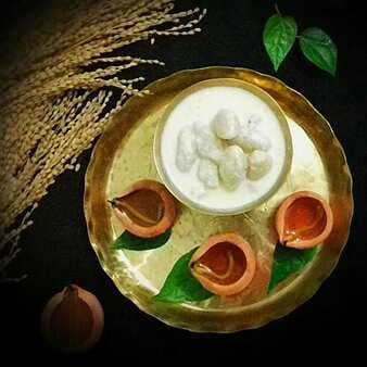 Bengali doodh puli (coconut-semolina dumplings in sweet milk)