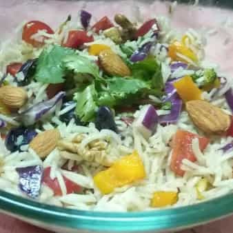 Brown rice with veggies fruits and roasted nuts salad (very healthy option for reducing weight)