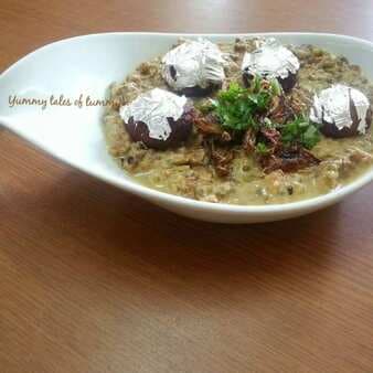 Chandi ke mung(stuffed khoyaballs ingreen lentils)