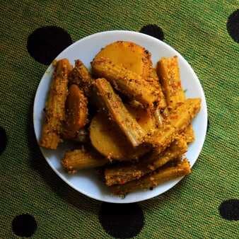 Chuin aloo besara (potato and drumsticks fry in a mustard paste odia style)