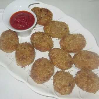 Crispy corn cutlets stuffed with paneer and dry fruits