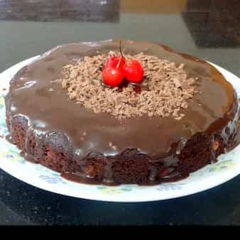 Eggless wholegrain cherry chocolate cake with chocolate glaze