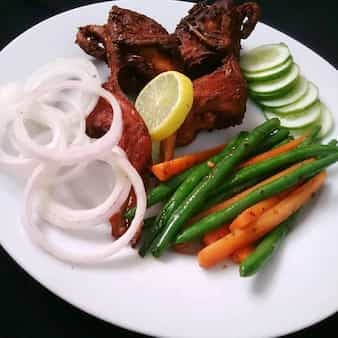 Fried quail with butter herb tossed veggies