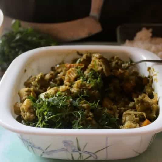 Hariyali subzi (mixed winter vegetables coated with a delicious green sauce)