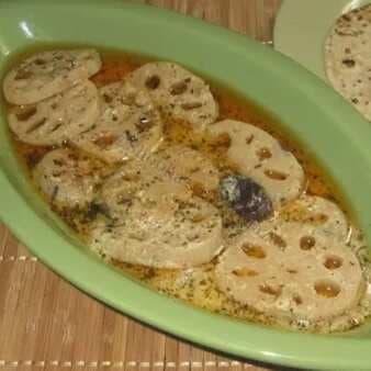 Kashmiri nadru yakhni/lotus stems cooked in yogurt gravy