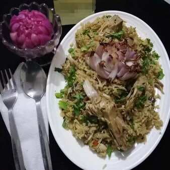 Katthal Biryani With Blooming Roasted Onion Flower And Vinegar Pickled Onions