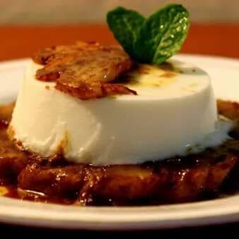 Pina colada pannacotta with caramelized pineapple and butter rum sauce