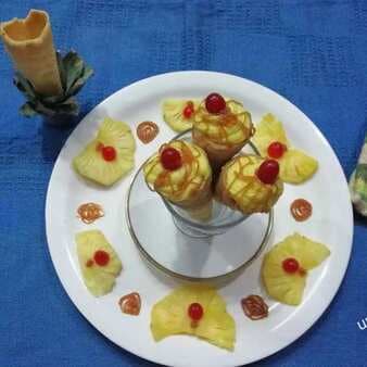 Pineapple shreekhand cone with caramel sauce