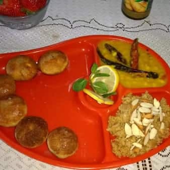 Rajasthani dal bati churma cooked in appe pan