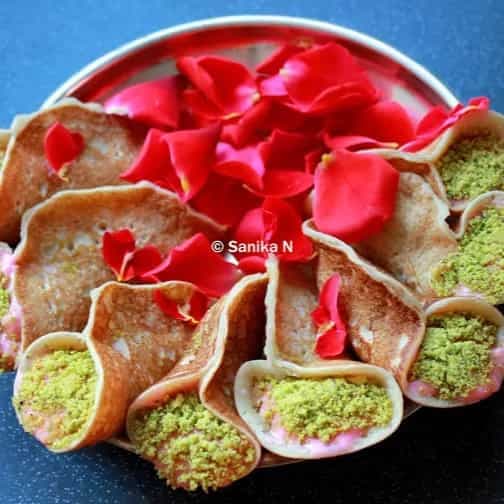 Rose flavoured atayef bil ashta-an arabic dessert