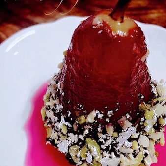 Ruby poached pistachio crusted pears