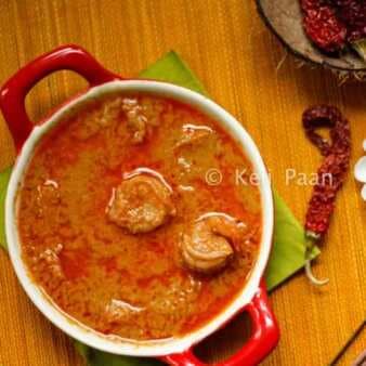 Sungta randai/prawns cooked in a red hot coconut gravy