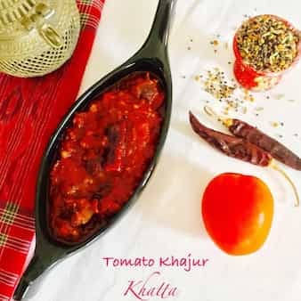 Tomato khajur khatta/sweet tomato chutney with dates