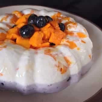 Vanilla mango and blueberry panna cotta