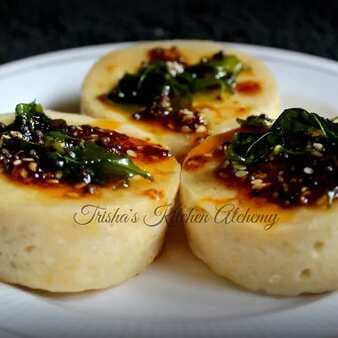 White (khatta) dhokla cups in the microwave
