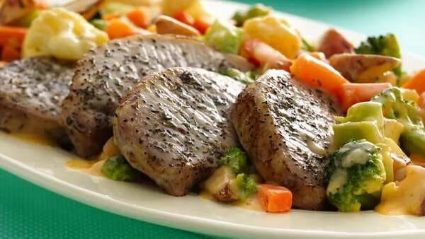 Roasted Pork Chops With Cheesy Vegetables