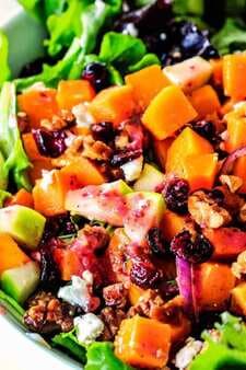 Roasted Butternut Squash Salad with Cranberries, Caramelized Pecans and Goat Cheese