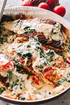 Creamy Pan Seared Salmon with Tomatoes and Spinach