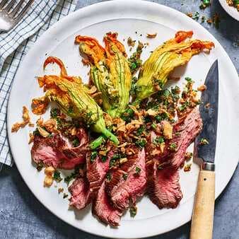Grilled Hanger Steak With Stuffed Squash Blossoms & Crispy Onions