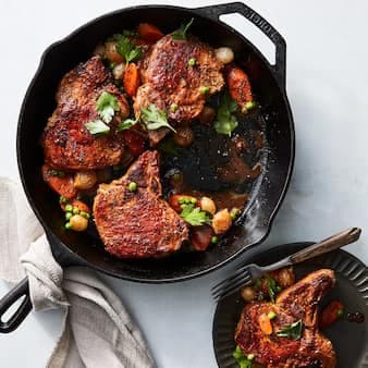 Skillet Pork Chops With Peas Carrots & Pearl Onions