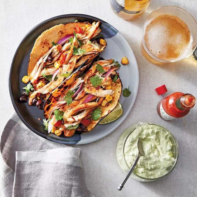 Slow-Cooker Chipotle Chicken Tacos With Avocado Crema