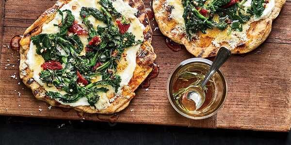 Grilled Flatbreads With Broccoli Rabe, Ricotta, And Rosemary Honey