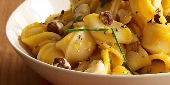 Pasta With Creamy Pumpkin Sauce And Toasted Hazelnuts