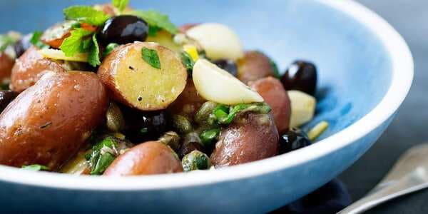 Herb-Roasted Potatoes With Lemon Sauce And Olives