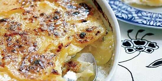 Herbed Potato Gratin With Roasted Garlic And Manchego