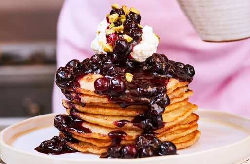  Pancakes With Blueberry Coulis And Baileys Almande Coconut Cream