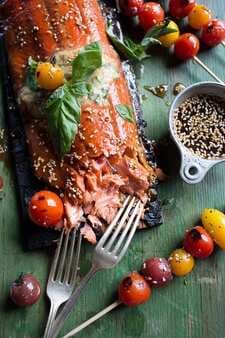 Cedar Plank Grilled Sesame Salmon With Kimchi Miso Butter And Grilled Tomatoes.