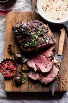 Roasted Beef Tenderloin With Mushrooms And White Wine Cream Sauce.