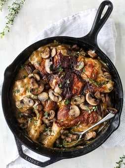 Skillet Smothered Chicken With Thyme Butter Mushrooms