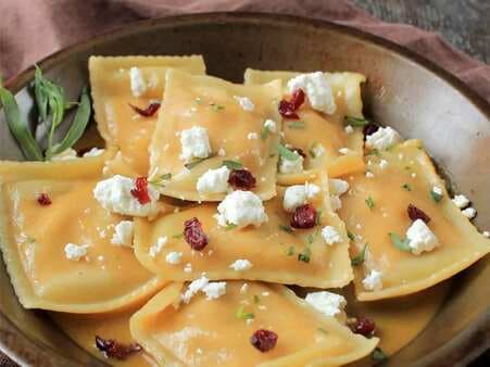 Butternut Squash Ravioli With Cranberry And Tarragon Crumbled Goat Cheese