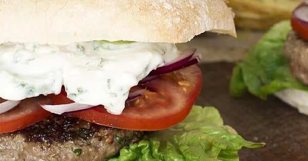 Greek Lamb Burgers With Creamy Feta And Cucumber Sauce And Lemony Wedges
