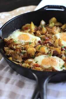 Skillet Baked Eggs With Country Potatoes And Bacon