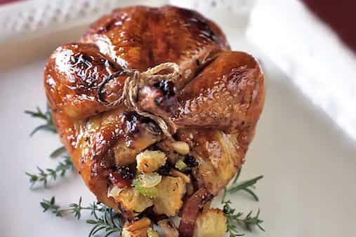 Pomegranate Glazed Cornish Game Hens with Pine Nut and Currant Bread Stuffing