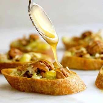 Blue Cheese Crostini with Pecans and Honey