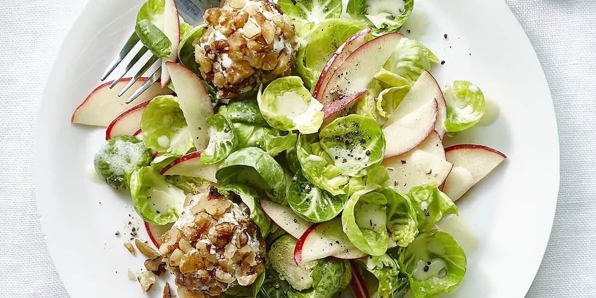 Brussels Sprouts Salad With Apples, Walnuts And Goat Cheese