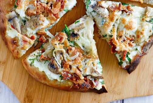 White Pizza with Arugula Bacon and Mushrooms