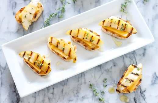 Grilled Pear and Gouda Crostini with Honey and Thyme