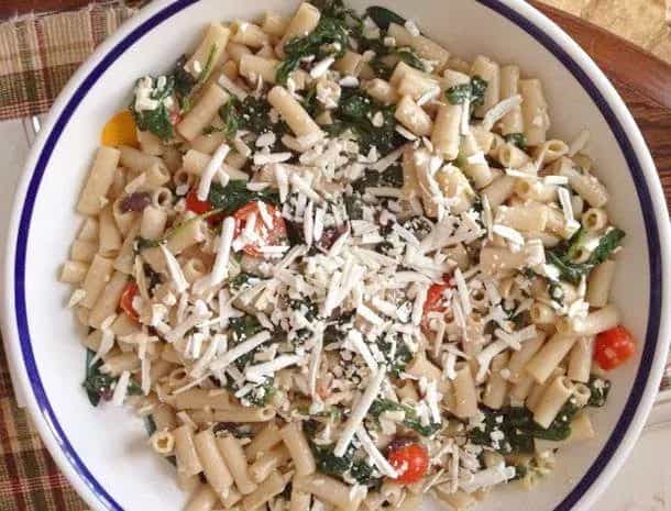Gluten-Free Pasta With Ricotta Salata, Garlicky Spinach, Tomatoes, And Olives