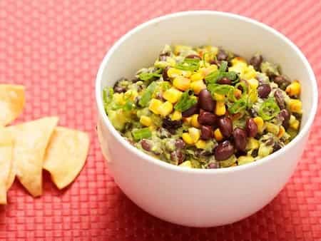 Guacamole With Charred Corn, Black Beans, And Scallions