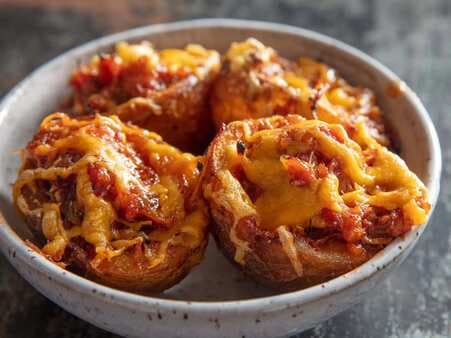 Deep-Fried Potato Skins With Pulled Pork And Cheddar